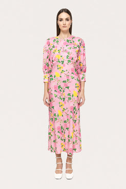 Front view of a model wearing a Nissa pink floral print viscose midi dress with 3/4 puff sleeves.