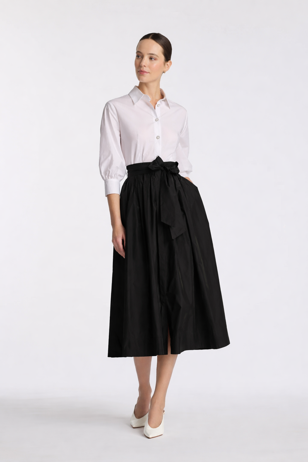Black and white shirt dress with 3/4 sleeves and elegant flared midi skirt