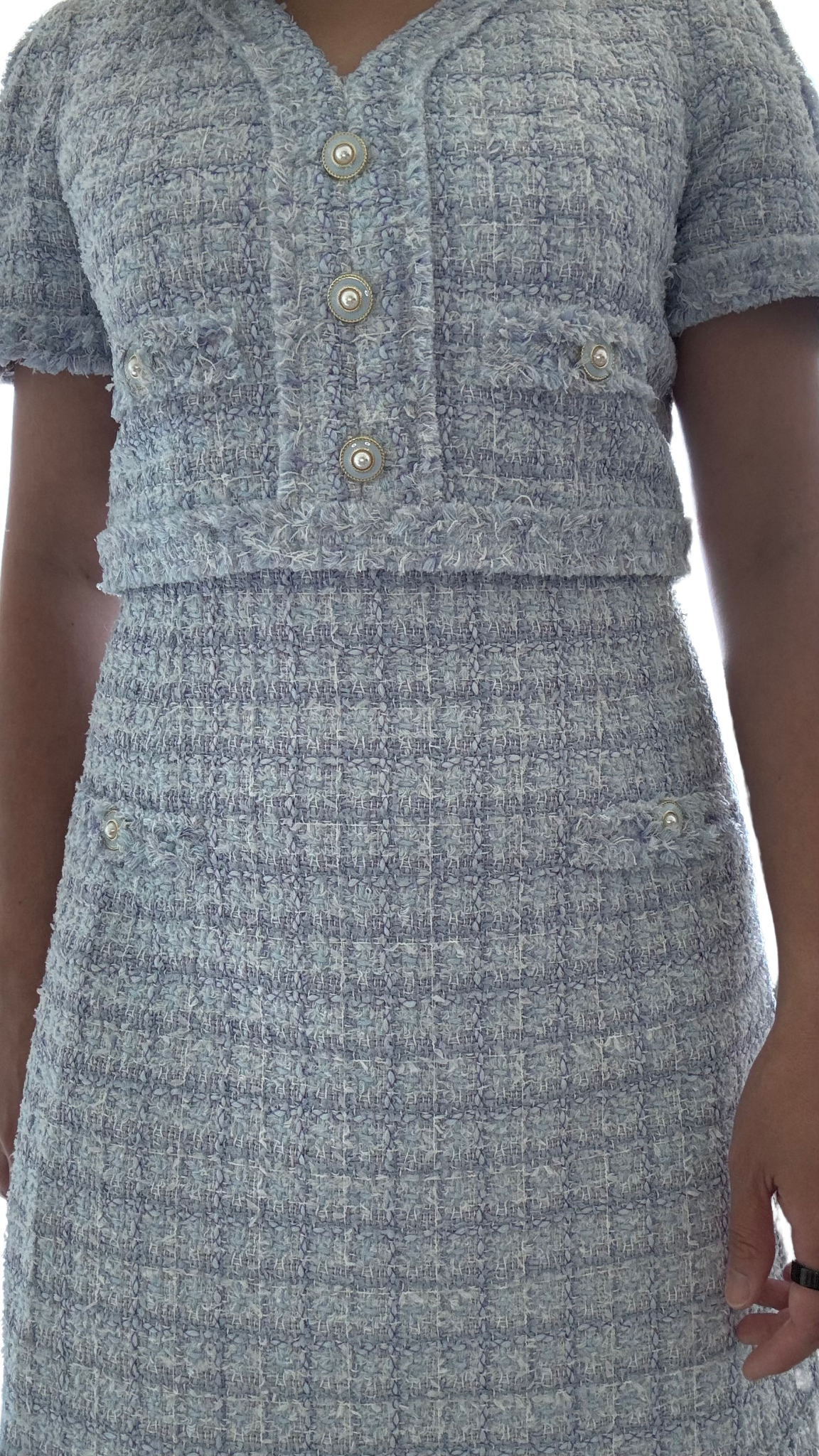 Parisian tweed dress with V-neckline and decorative flap pockets