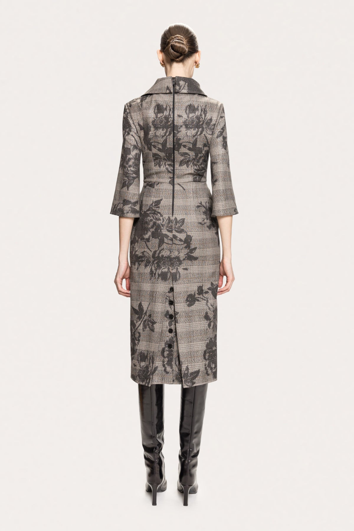 Back view of NISSA gray floral plaid midi dress with a center-back zip and decorative skirt buttons.