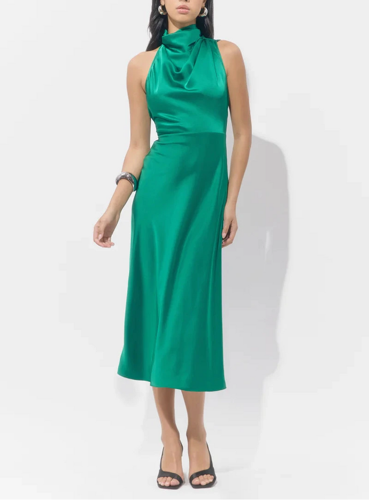 Emerald green satin midi dress with high neck and flowing silhouette by Adelyn Rae