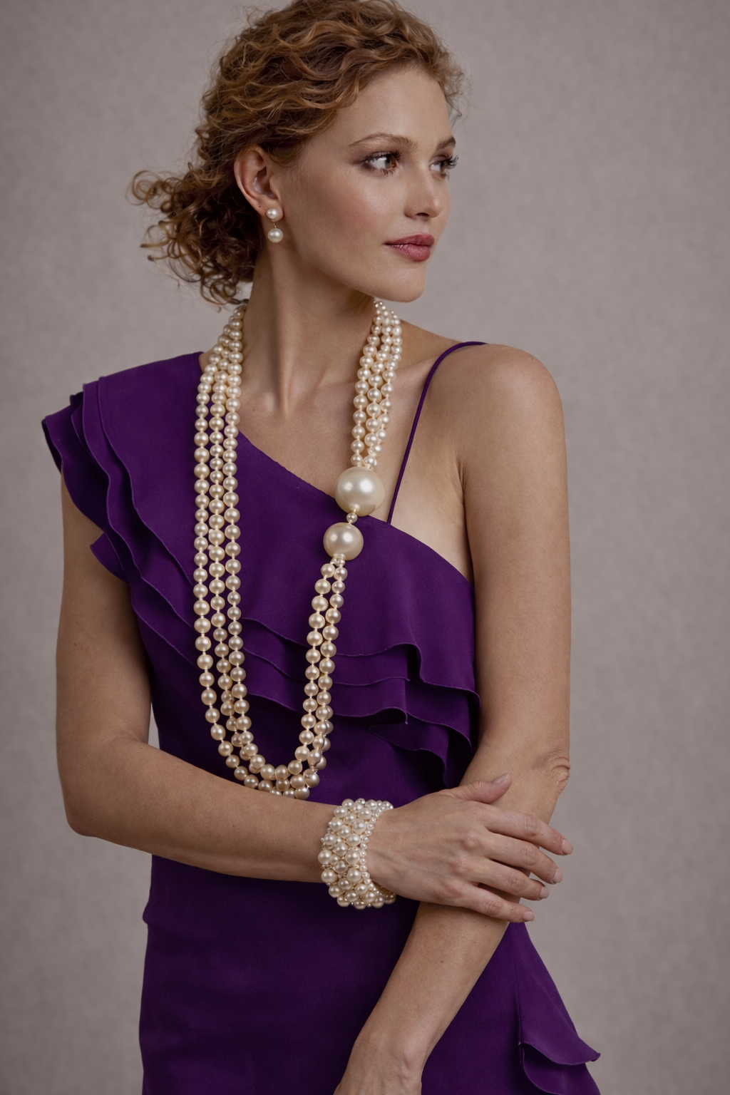 model wearing long pearl necklace with oversized pearls statement pearl jewelry