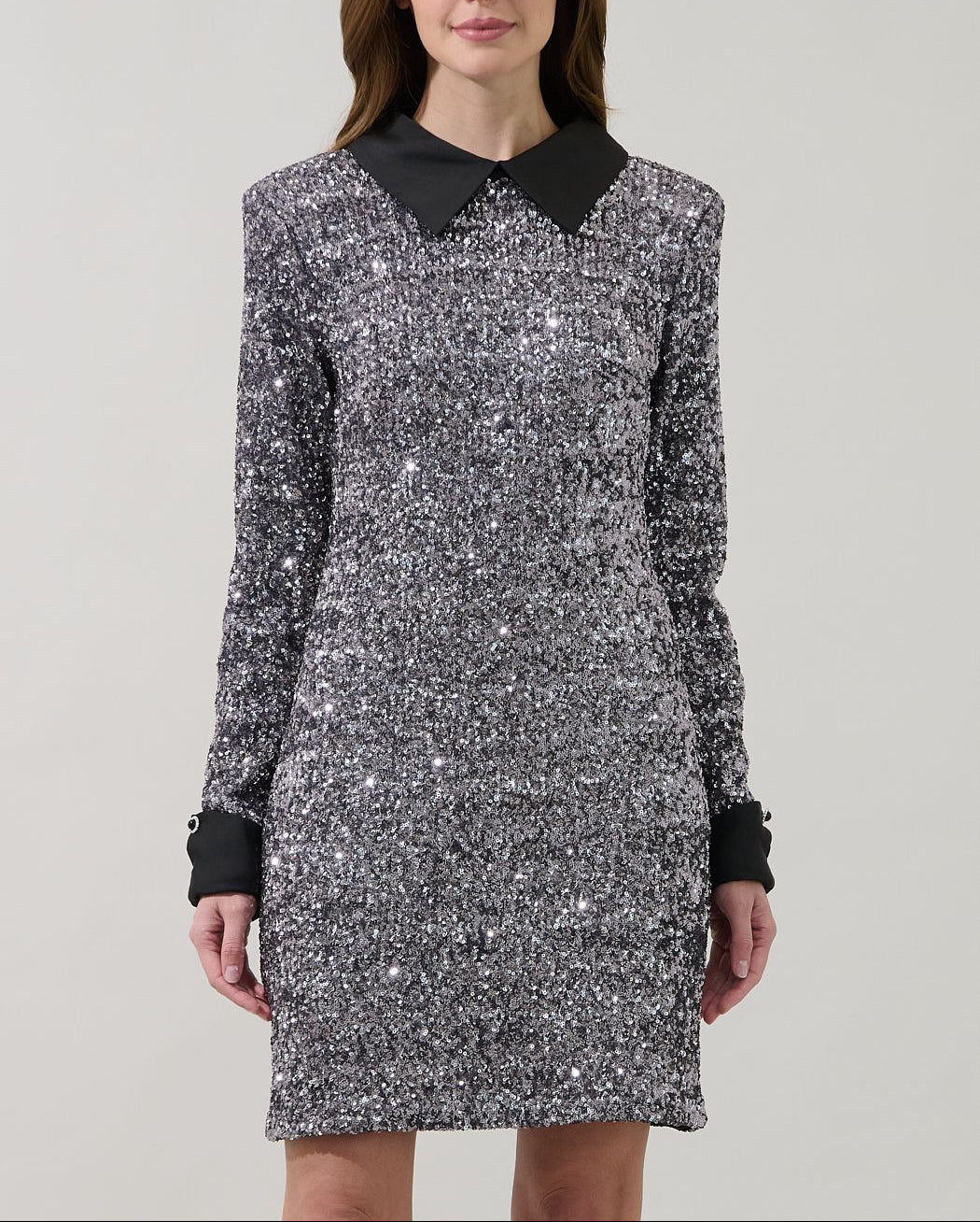 Front view of the Sugarlips Alexa silver sequin mini dress highlighting its pointed black collar and shift silhouette.
