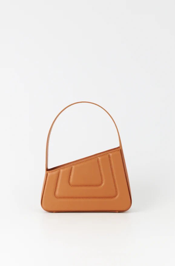 Albert small tan leather handbag by D’ESTRÉE made in Spain with modern asymmetrical shape