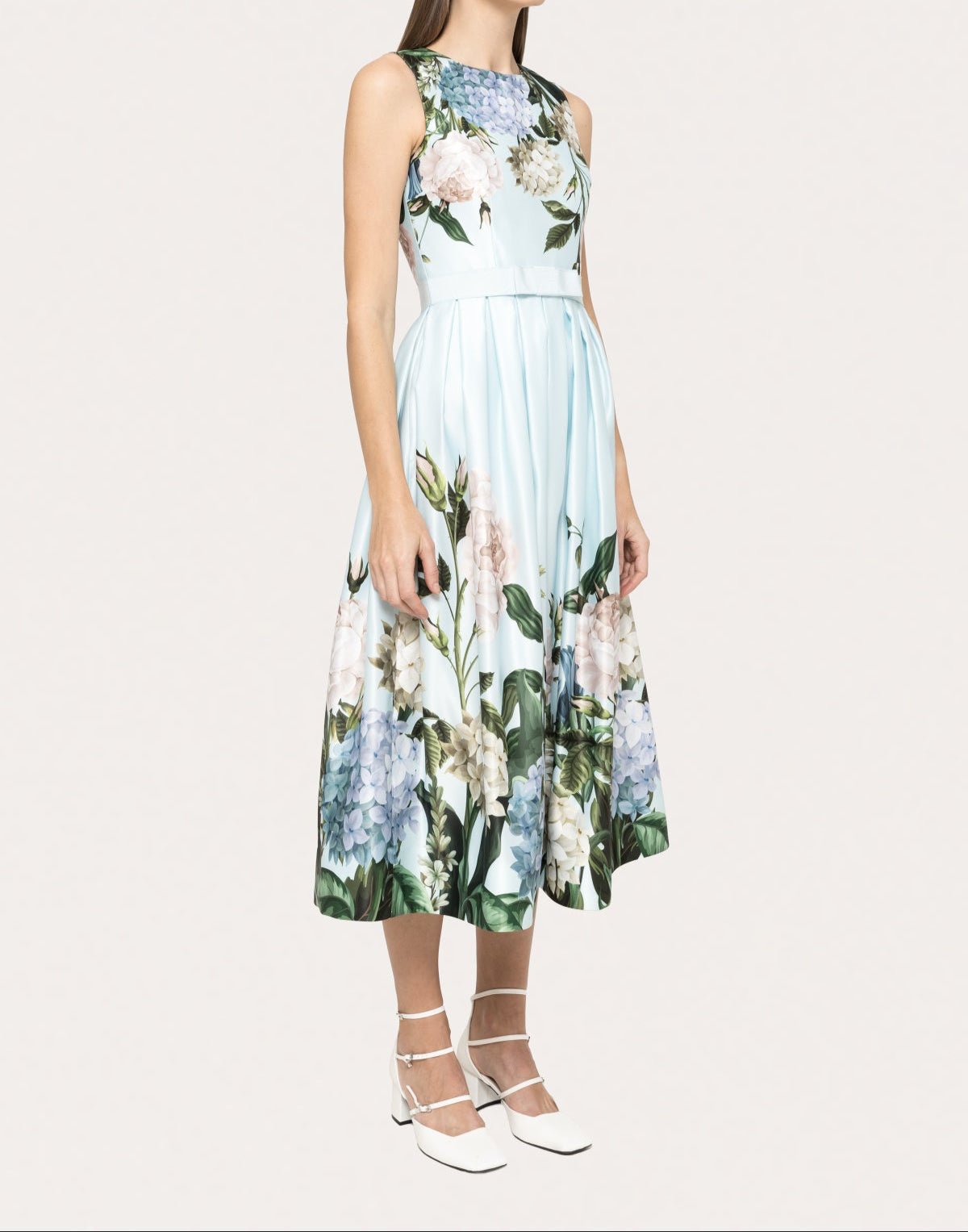 Elegant printed taffeta midi dress in pastel blue with botanical floral design, shown at a three-quarter angle- BTK COLLECTIONS