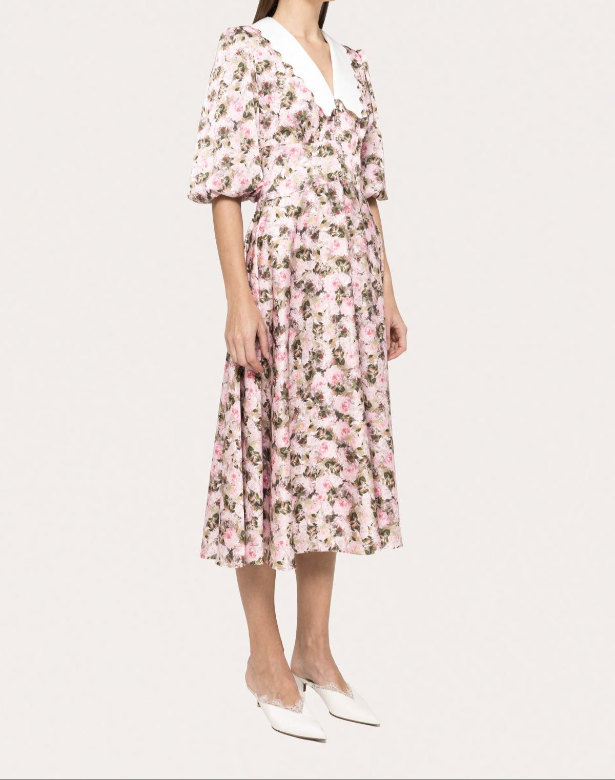 Side view of pink rose print midi dress with puff sleeves and white contrast collar- BTK COLLECTIONS