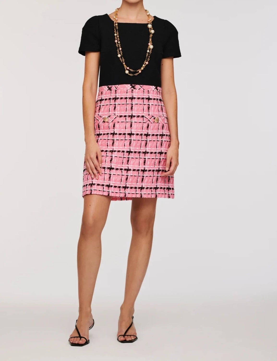 Weill Paris dual-material tweed dress with black top and pink tweed skirt.
