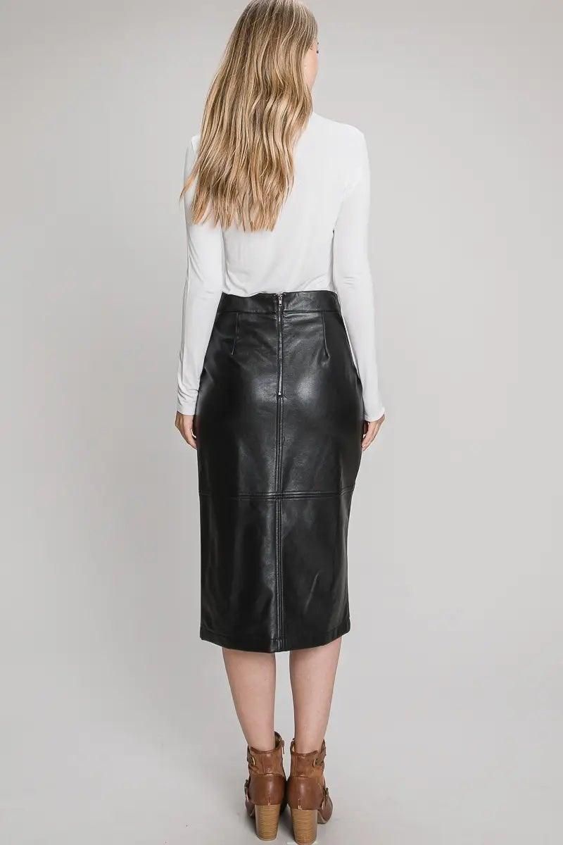 Back view of black faux leather midi skirt showing an exposed zipper and shaping darts.