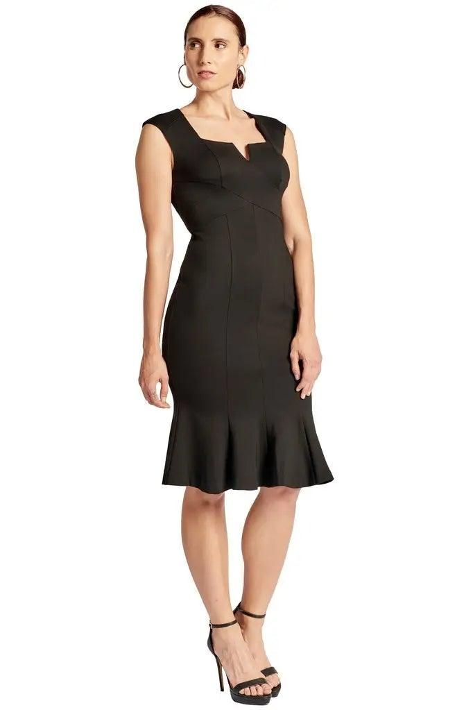 Front view of the Simona Maghen Ivy black dress showing diagonal bodice seams, a V-notched square neckline and mermaid hem.