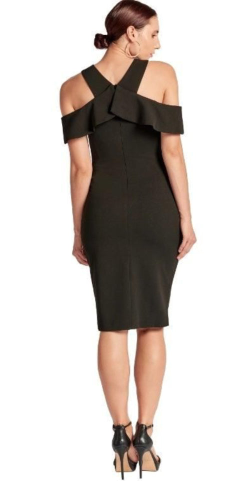 Back view of the Simona Maghen Layla black dress showing crossed straps, cold shoulder details and hidden back zip.