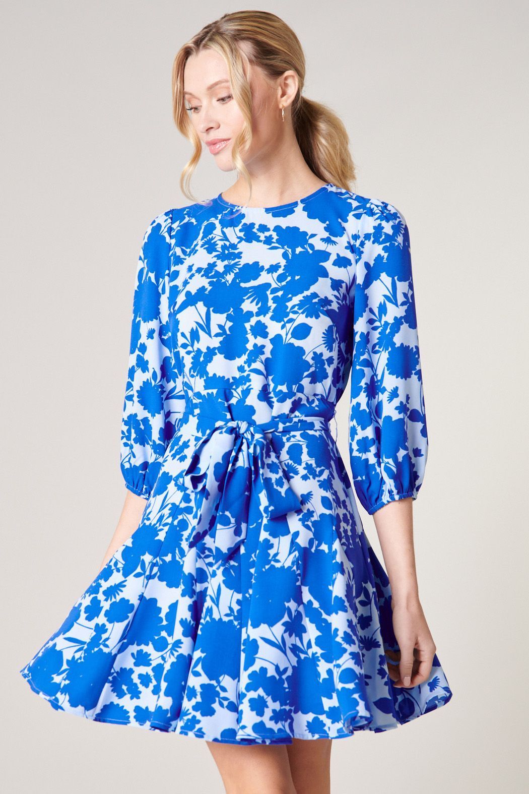 Blue floral balloon sleeve mini dress with tie waist front view