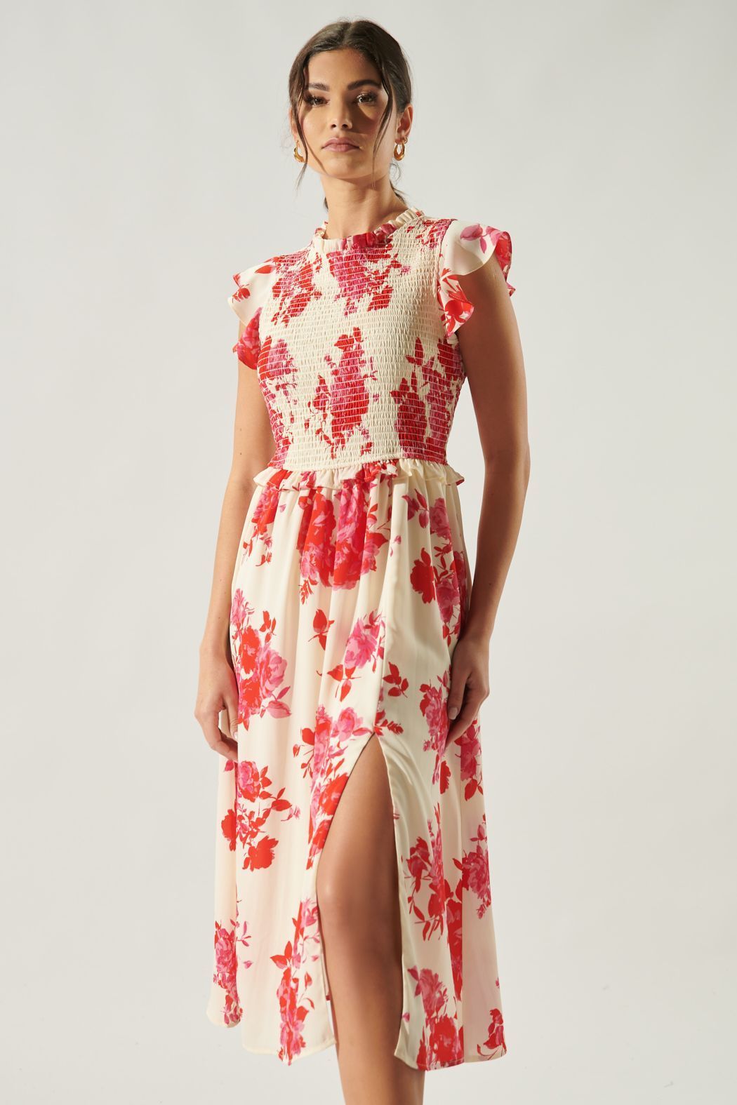 Ivory and crimson floral midi dress with smocked bodice and ruffle sleeves side view