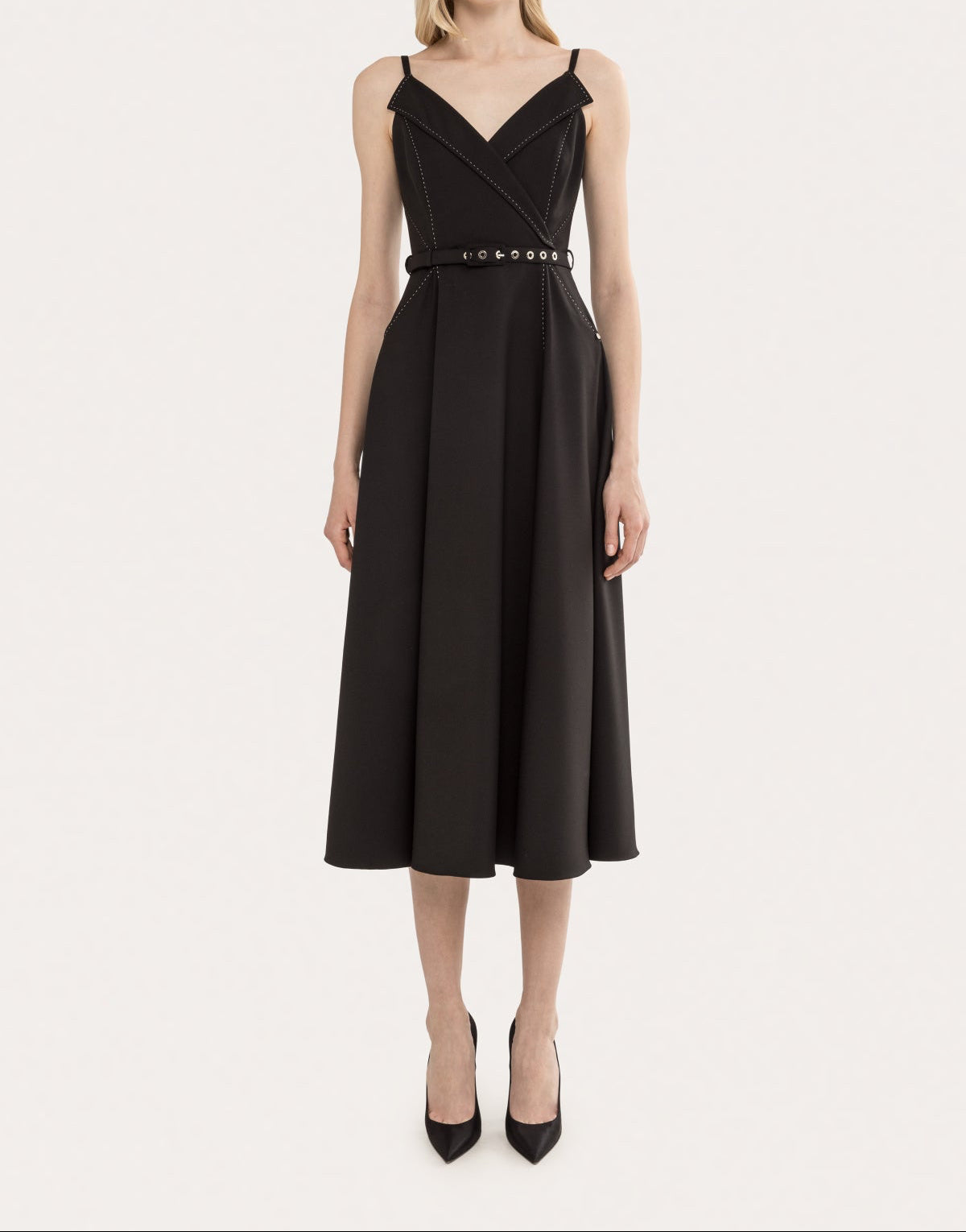 Front view of a black sleeveless V-neck midi dress with belt detail, lapel-inspired neckline, and A-line skirt