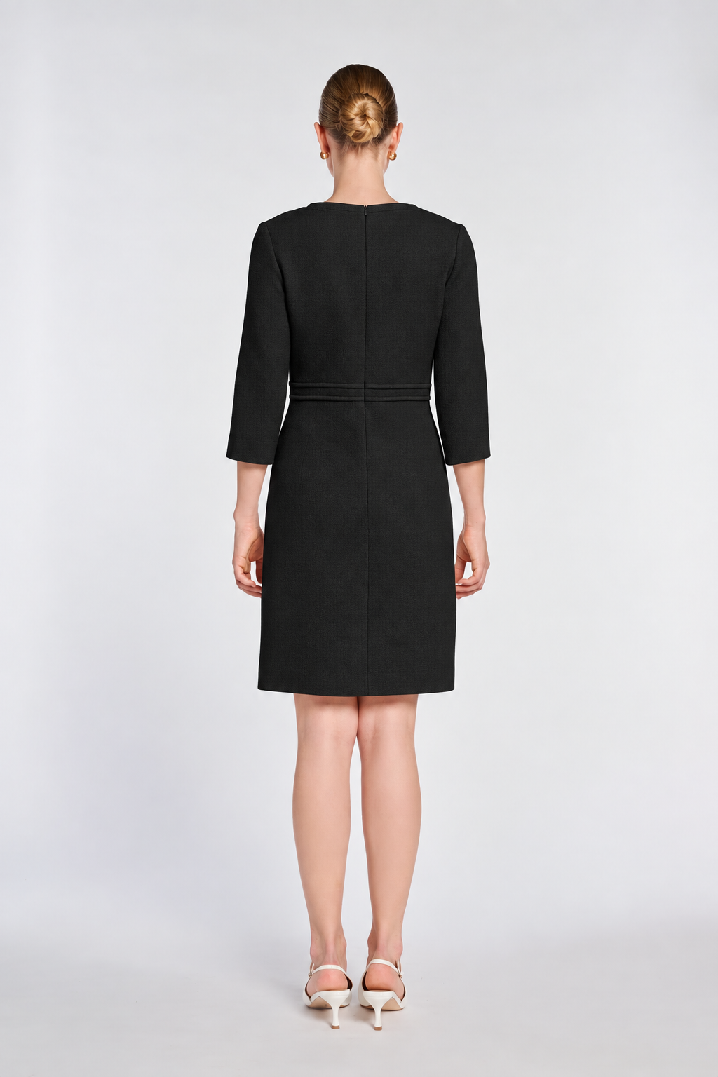 Back view of the Weill Paris black wool dress with three-quarter sleeves and a straight skirt