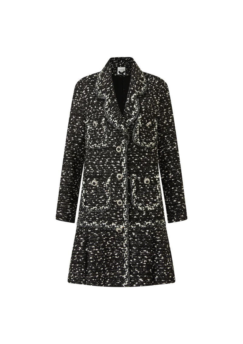 Black and white tweed coat dress with notched lapel, jewel buttons, patch pockets and flounced hem
