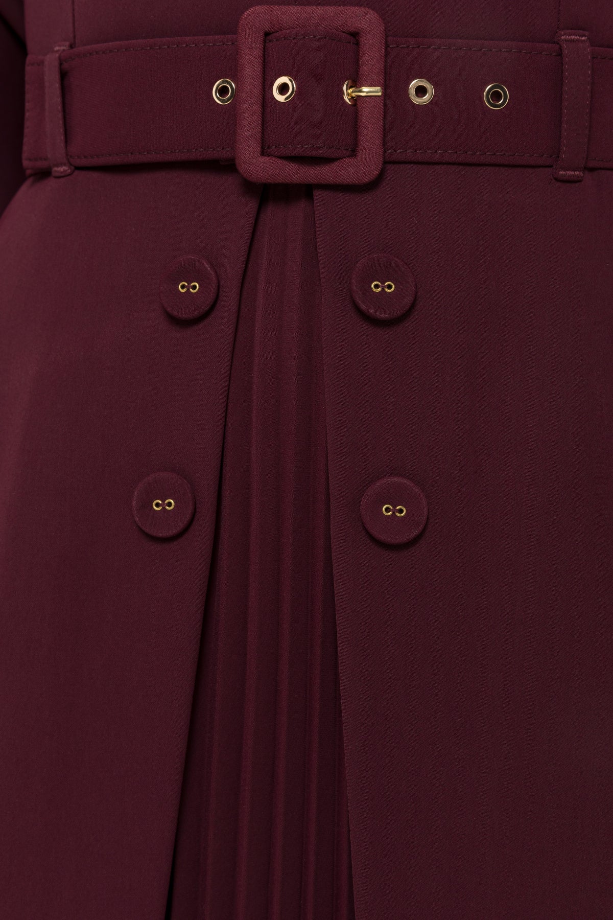 Close-up of four fabric-covered buttons framing the center-front pleated panel on the NISSA Bordeaux midi dress.