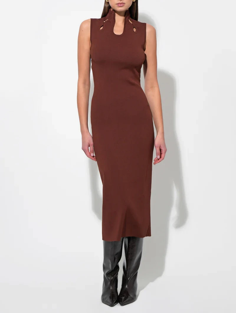 Model wearing Chocolate Trish Sculpted Cut-Out Knit Midi Dress by Adelyn Rae, featuring a sleeveless fitted silhouette, high neckline with cut-out detail, and rich chocolate brown color.