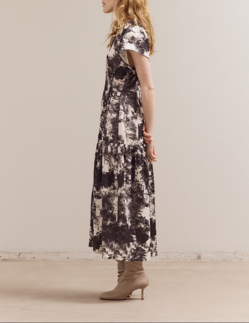 Ivory printed ruffle satin midi dress from Grade & Gather with short sleeves and tiered skirt.