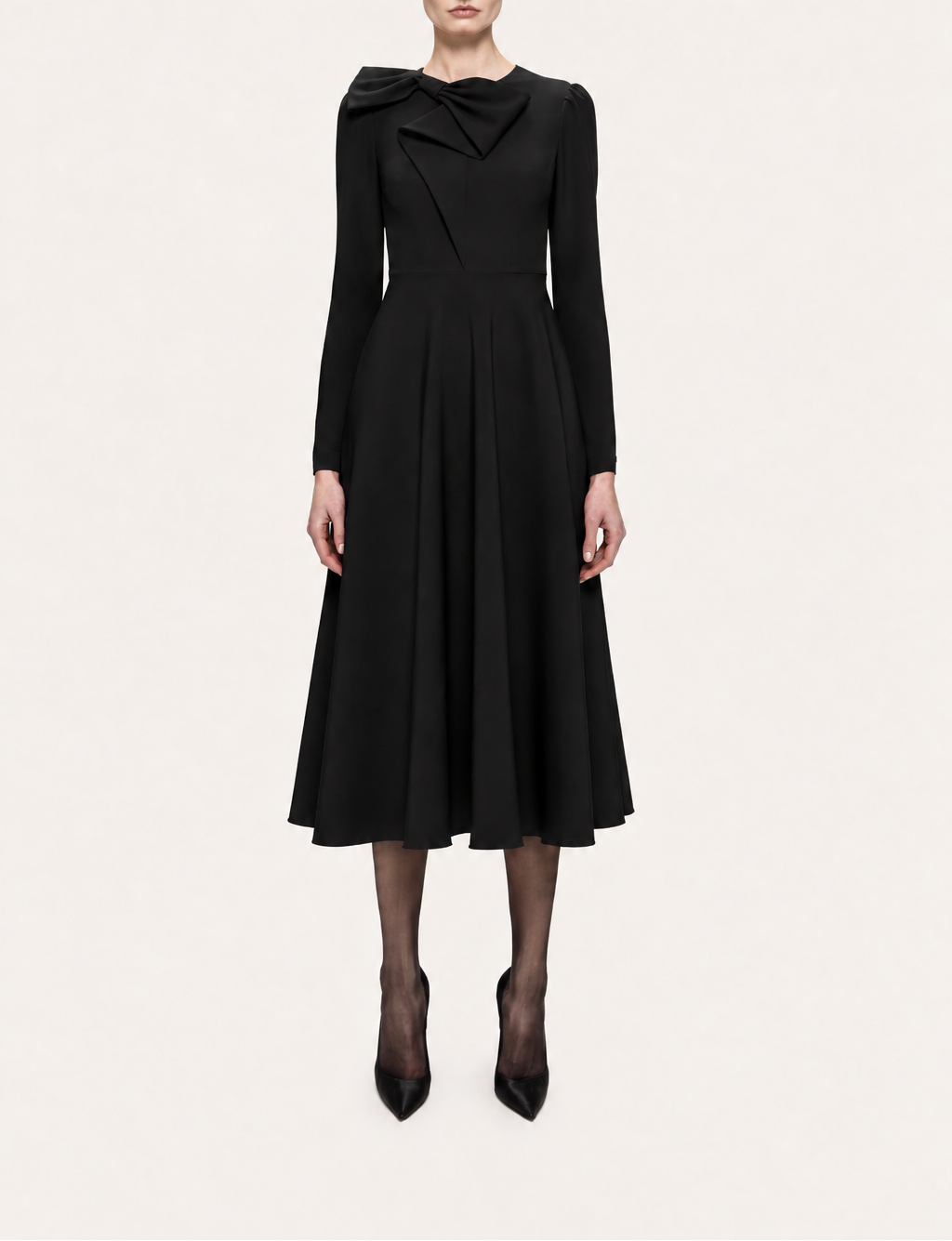 Full-length view of NISSA black long sleeve midi dress showing the fitted bodice and flared A-line skirt.