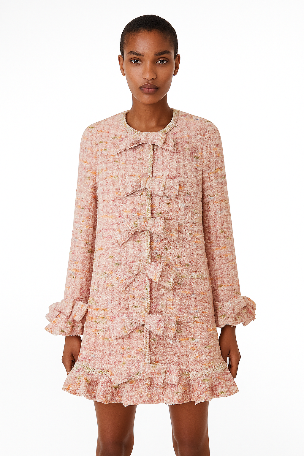 Edward Achour Paris pastel tweed coat dress with bow button front, long sleeves, and feminine tailored silhouette