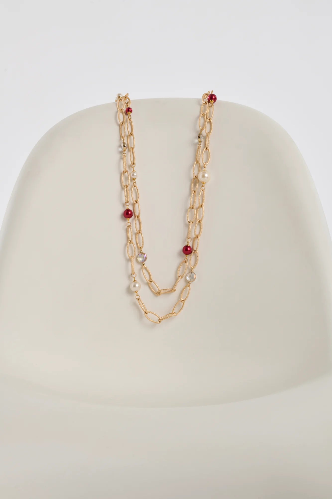 Long double chain necklace with red pearls, elegant design by WEILL.