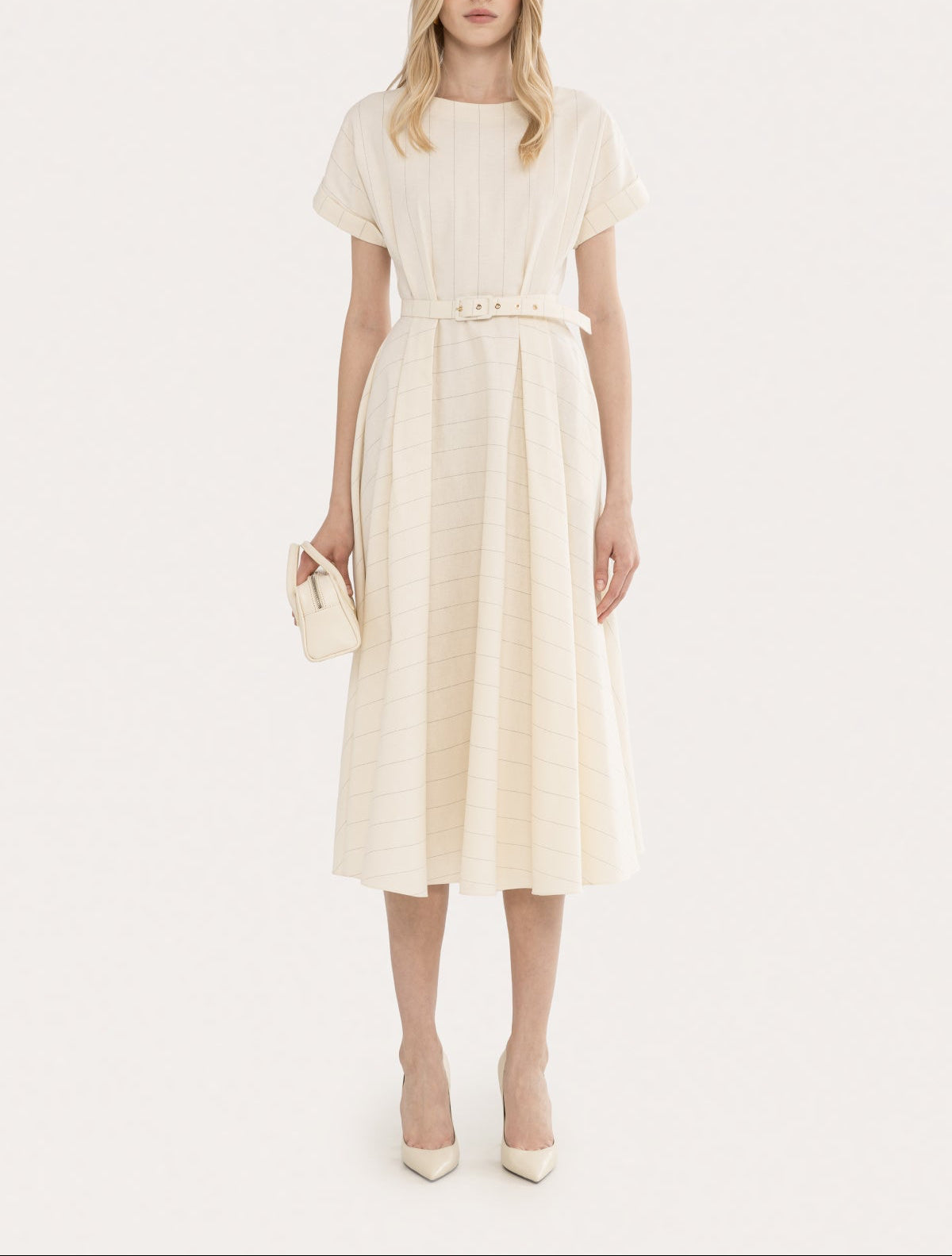 Front view of an ivory striped belted midi day dress with short cuffed sleeves and soft boat neckline