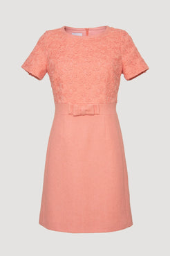 Front view of pink two-material Weill Paris dress with embroidered lace top and bow