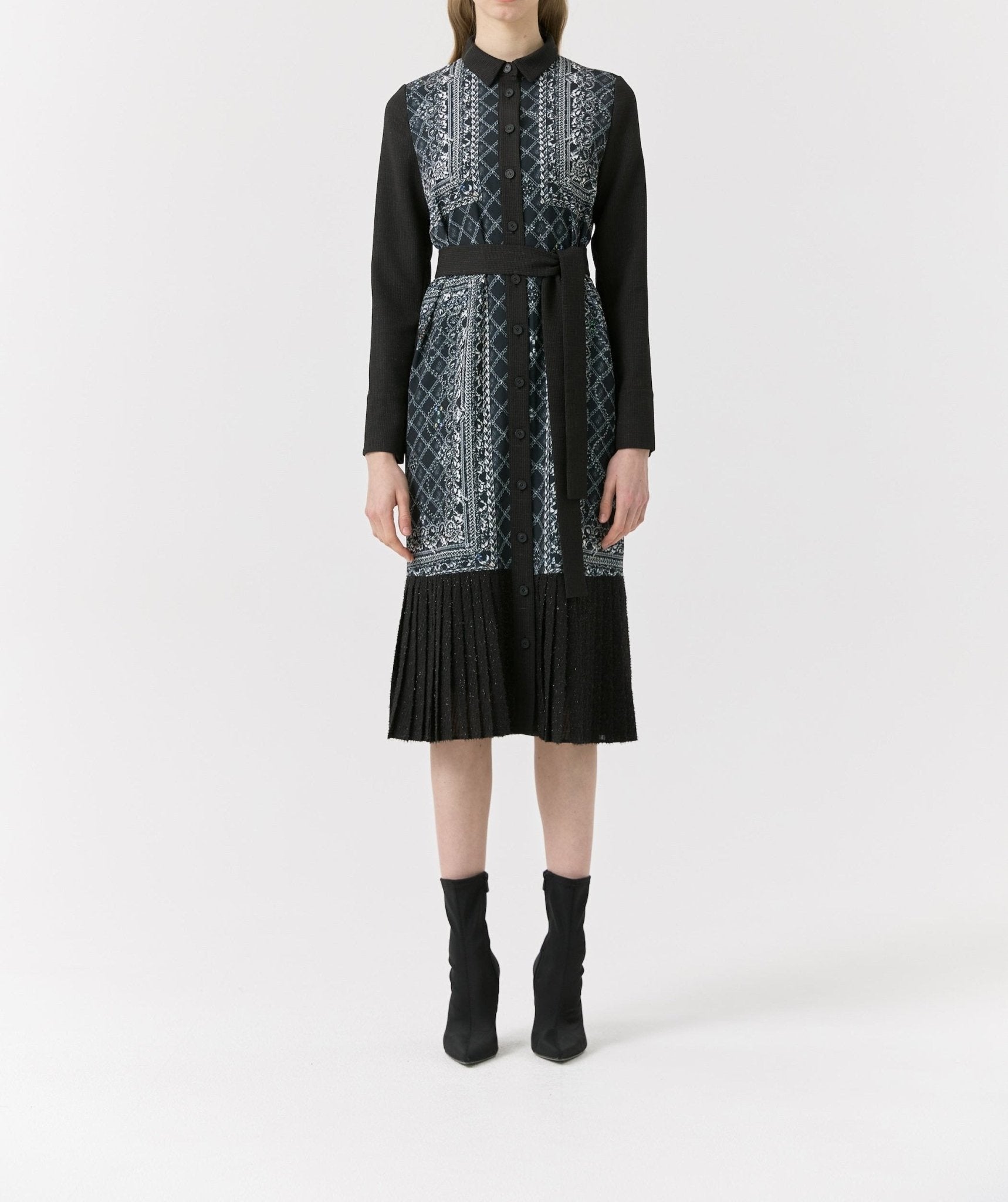 lack long sleeve midi dress with button-down front, collared neckline, belted waist, geometric print panel, and pleated hem detail.