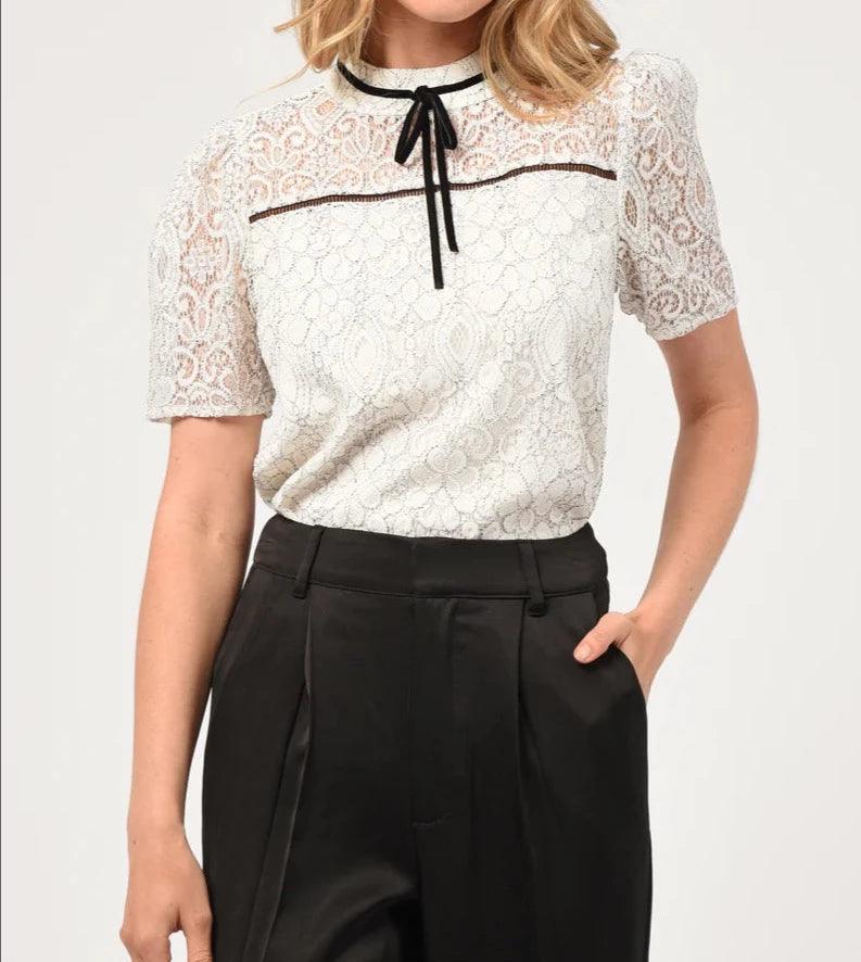 Adelyn Rae Nelli puff sleeve lace top with high neck and black ribbon detail