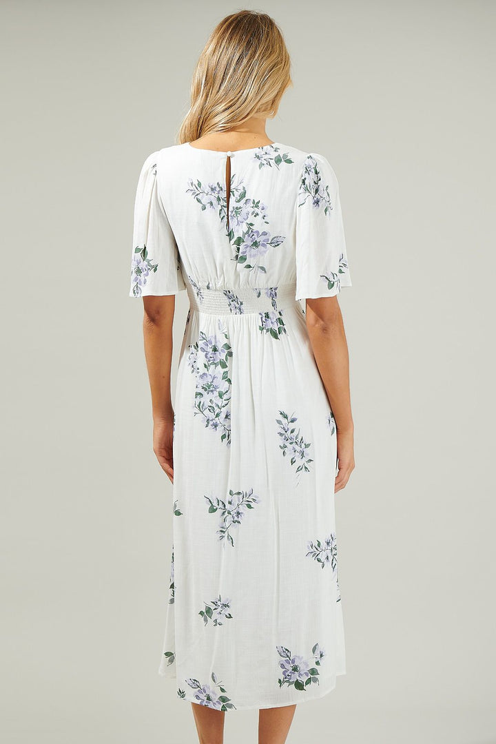 Back view of flutter sleeve white floral midi dress with smocked waist
