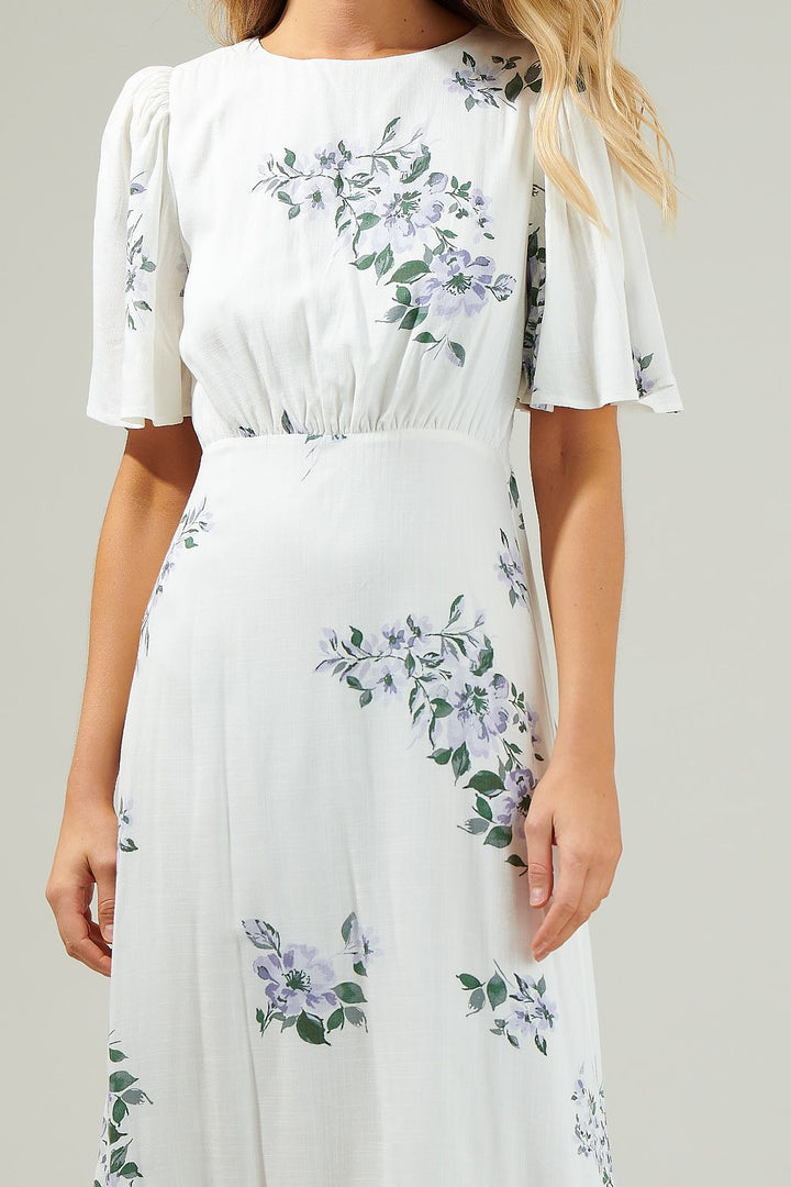 Close-up of floral pattern and waist detail of the Sugarlips Porto Dress