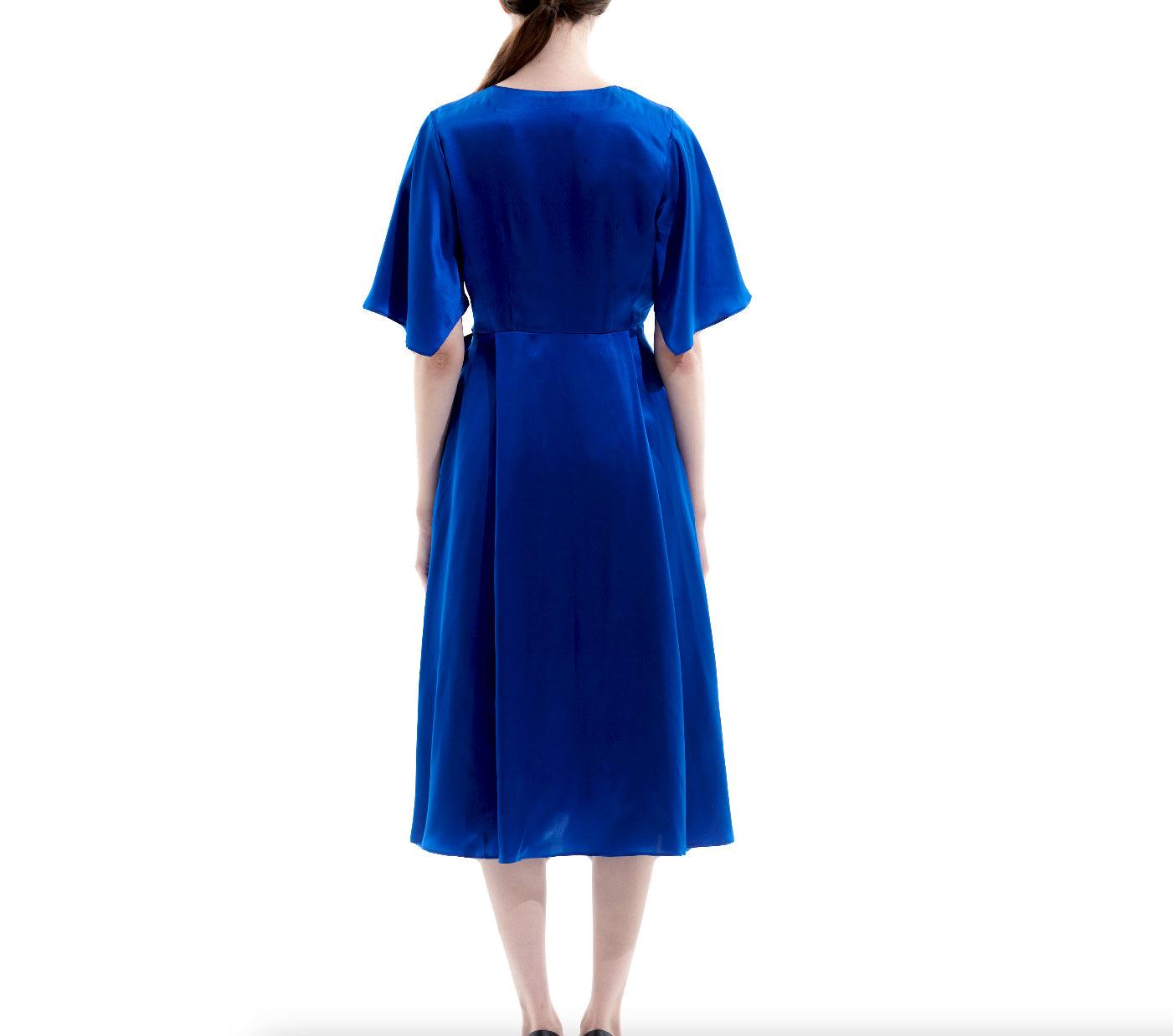 Back view of royal blue silk midi dress with flutter sleeves and elegant A-line silhouette