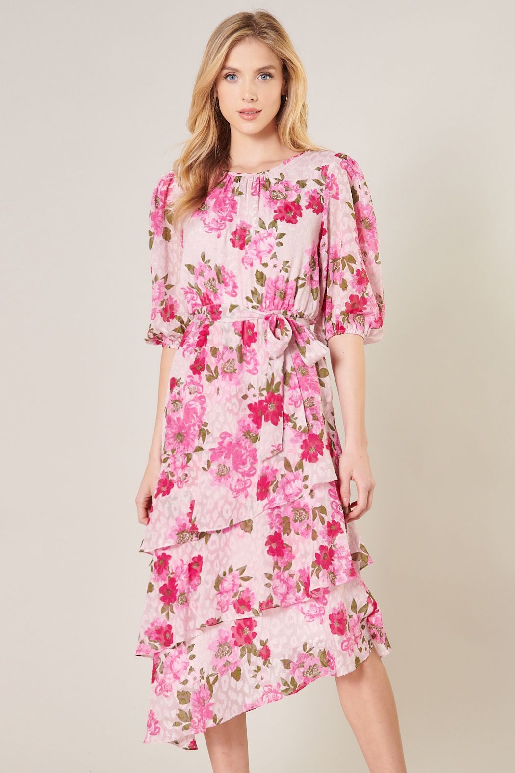 Pink floral asymmetrical ruffle midi dress with gathered neckline front view