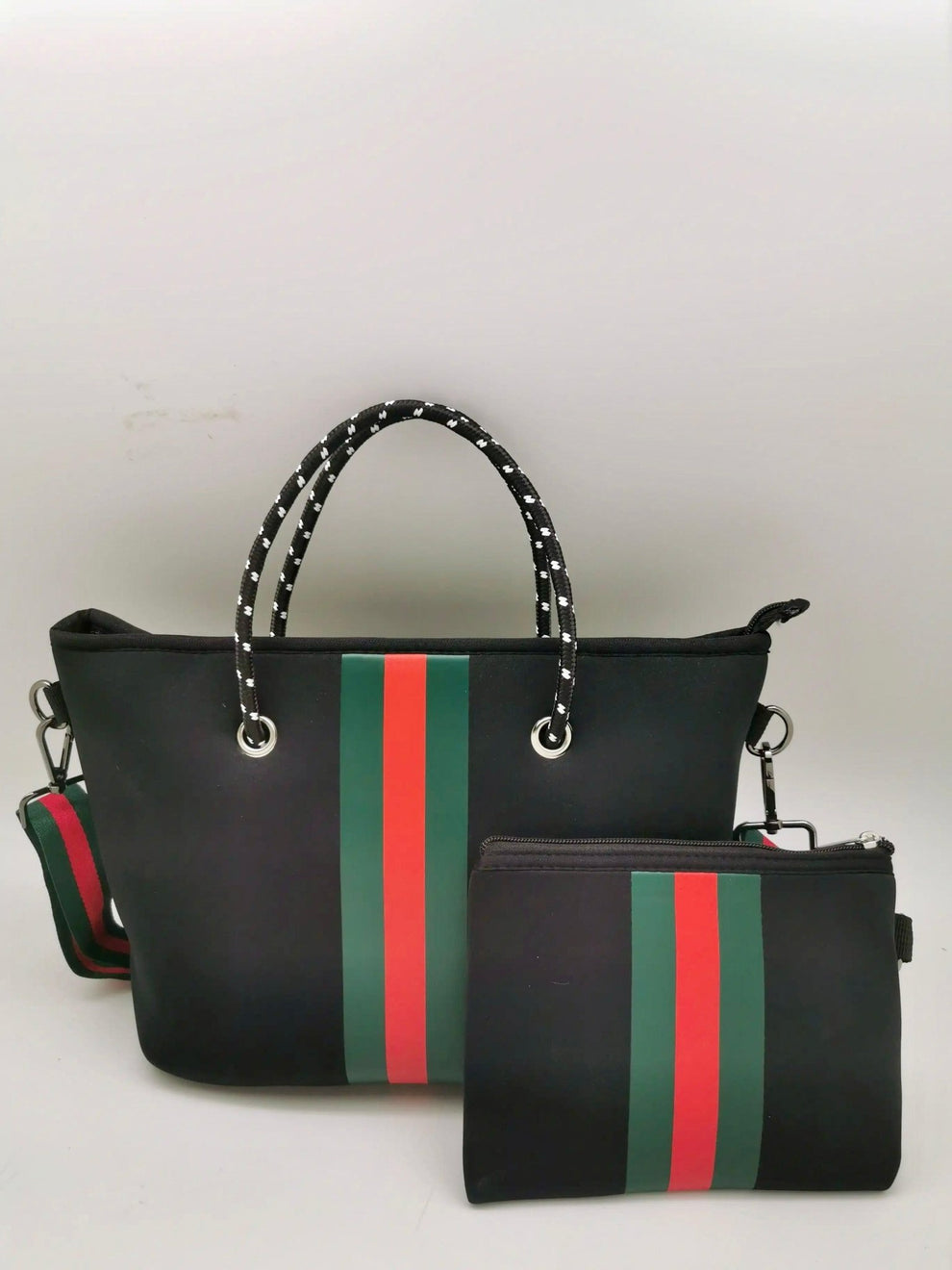 Black mini neoprene tote bag with red and green center stripe and rope handles