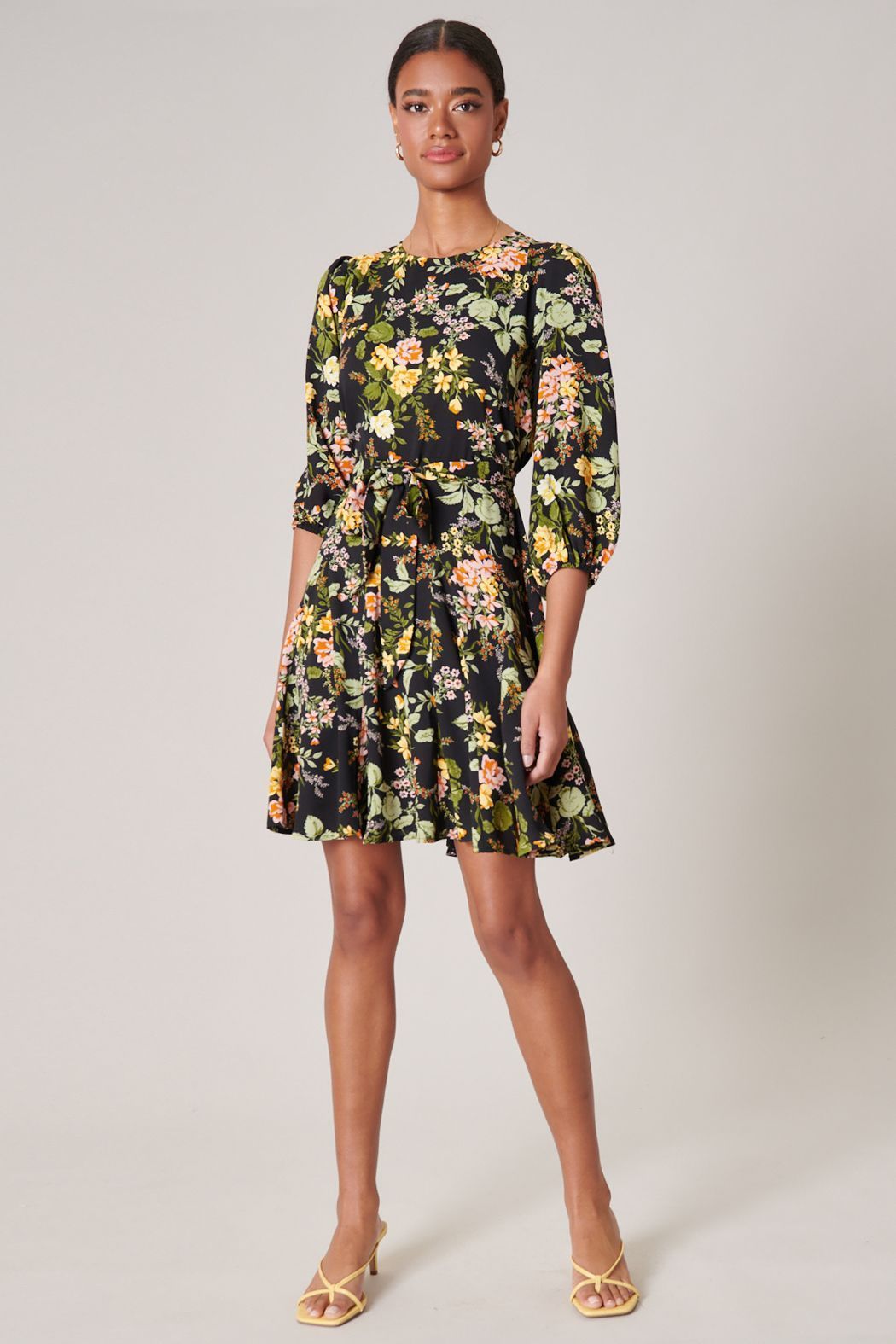 Black floral balloon sleeve mini dress with tie waist front view