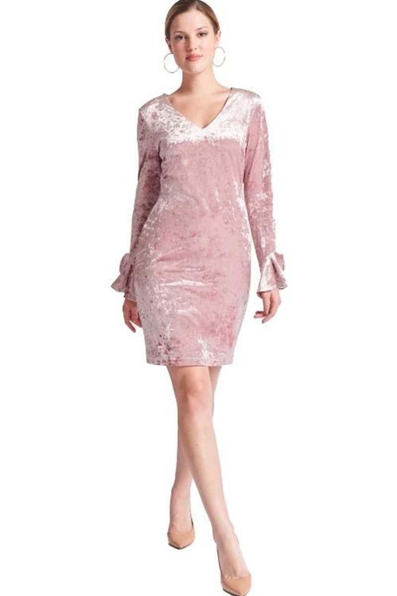 Kara Dress by Simona Maghen shown from the front, with a fitted velvet silhouette and flared ruffle cuffs.