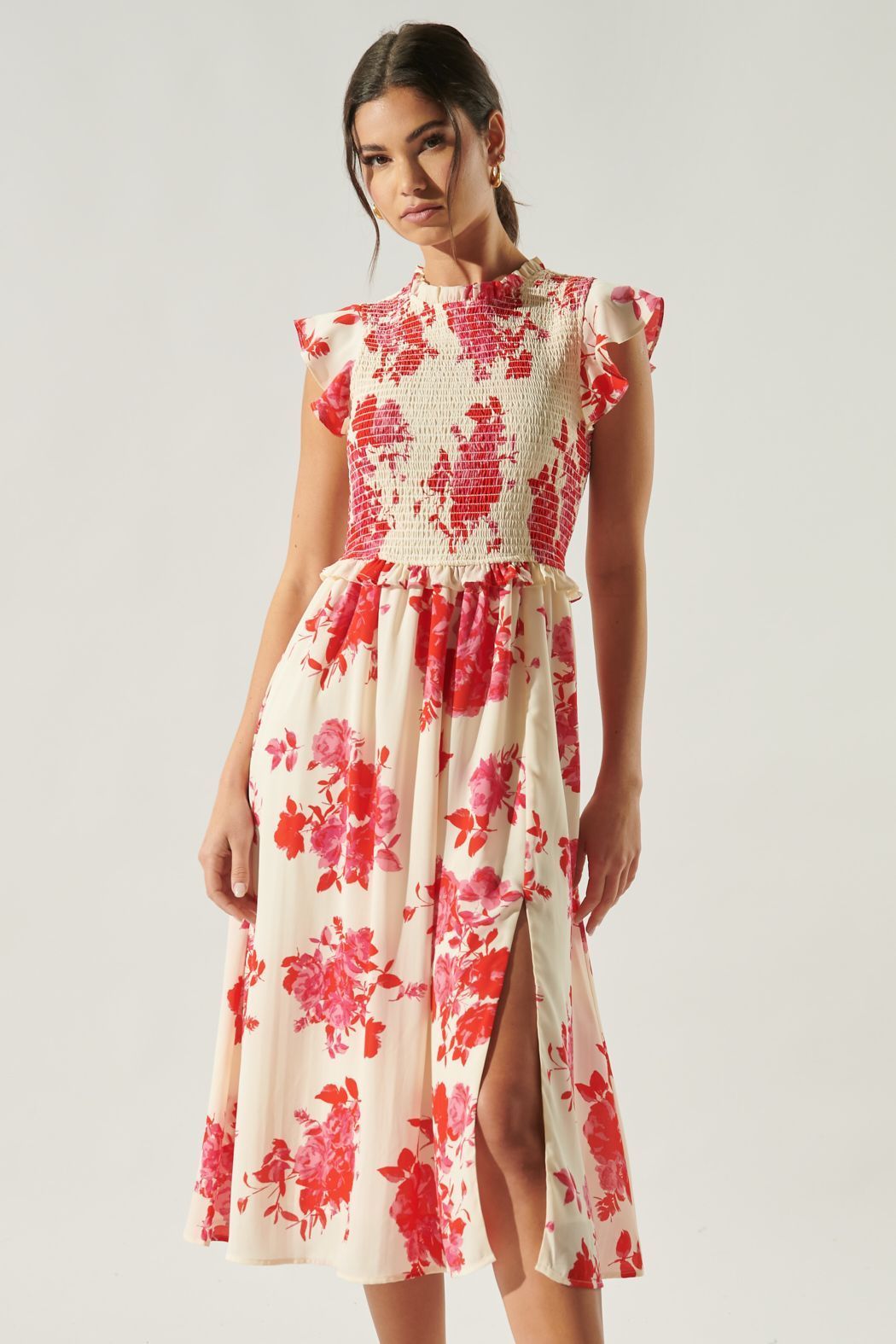 Crimson floral smocked midi dress with high ruffle neckline and front slit front view